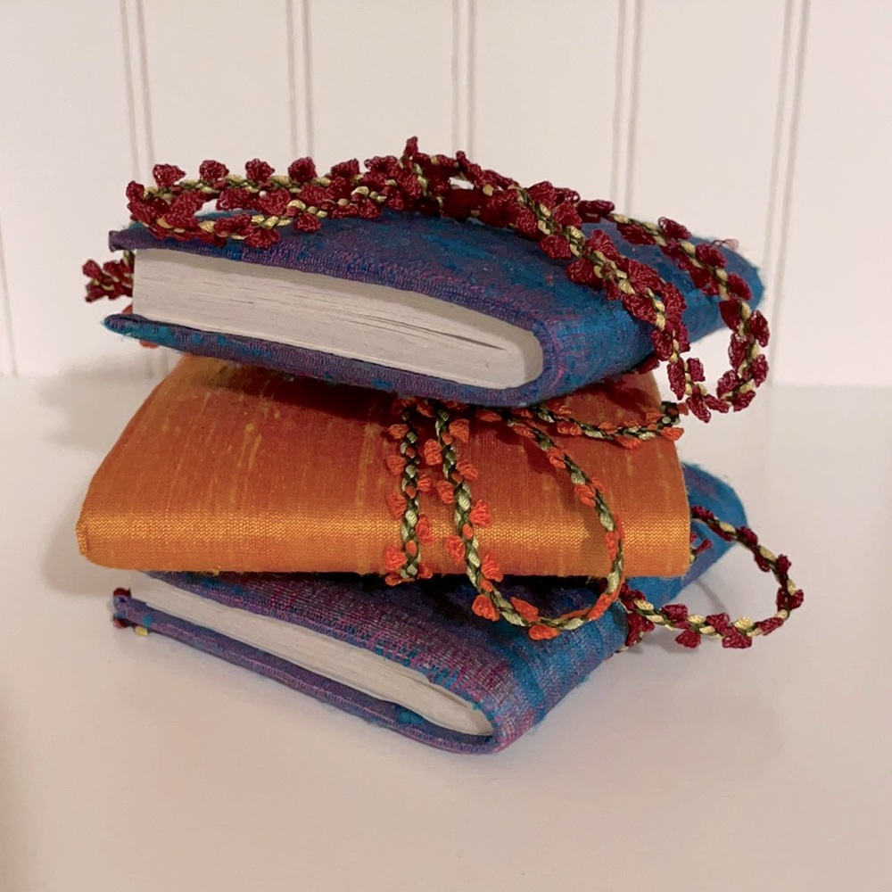 3 mini notebooks